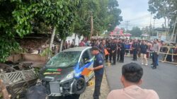 Nampak Anggota Kepolisian Dari Polres Kotamobagu Melakukan Olah TKP Atas Insiden Naas Di Lokasi Drag Race dan Drag Bike di Kelurahan Upai. (Foto: Istimewa)
