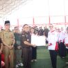 Perkuat Sinergi Hukum Desa, Plt Kajati Sulut Kukuhkan Pengurus Srikandi Jaga Desa dan ASLINMAS Bolsel